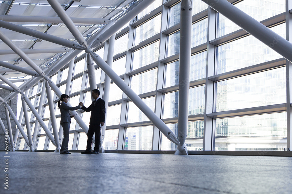 Company employees who are crossed hands