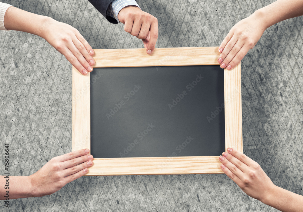 Hands holding frame