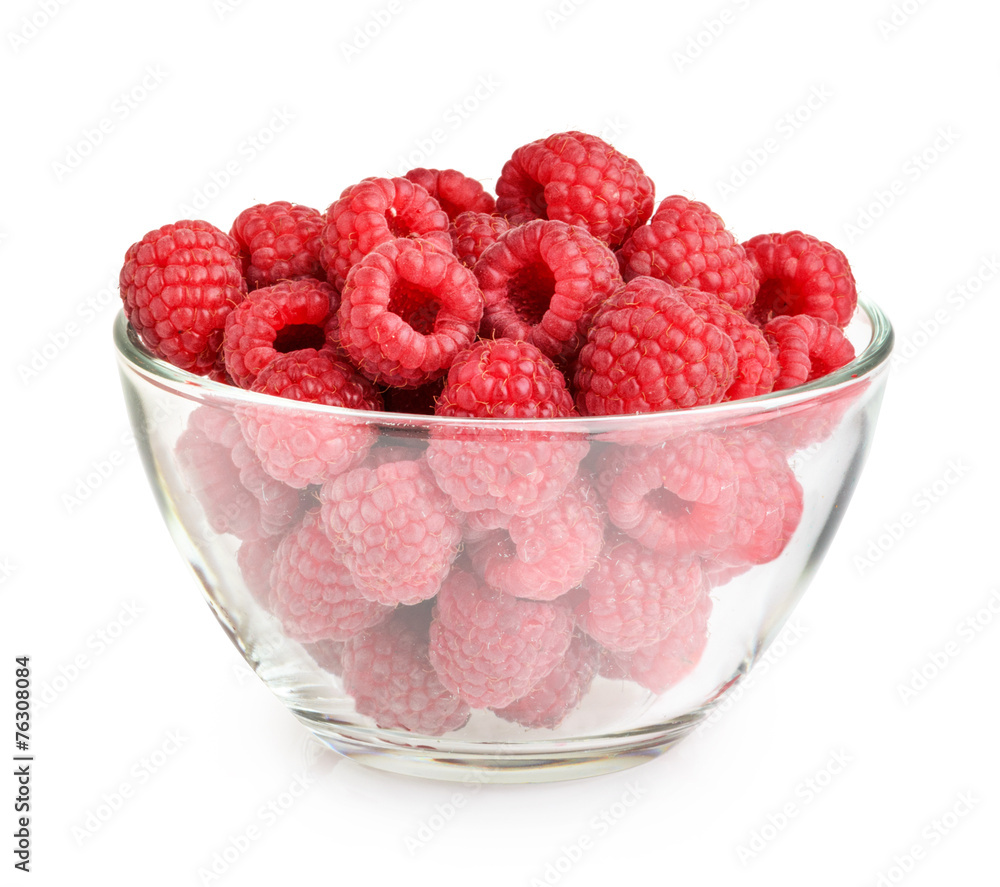 Raspberries in bowl isolated on white