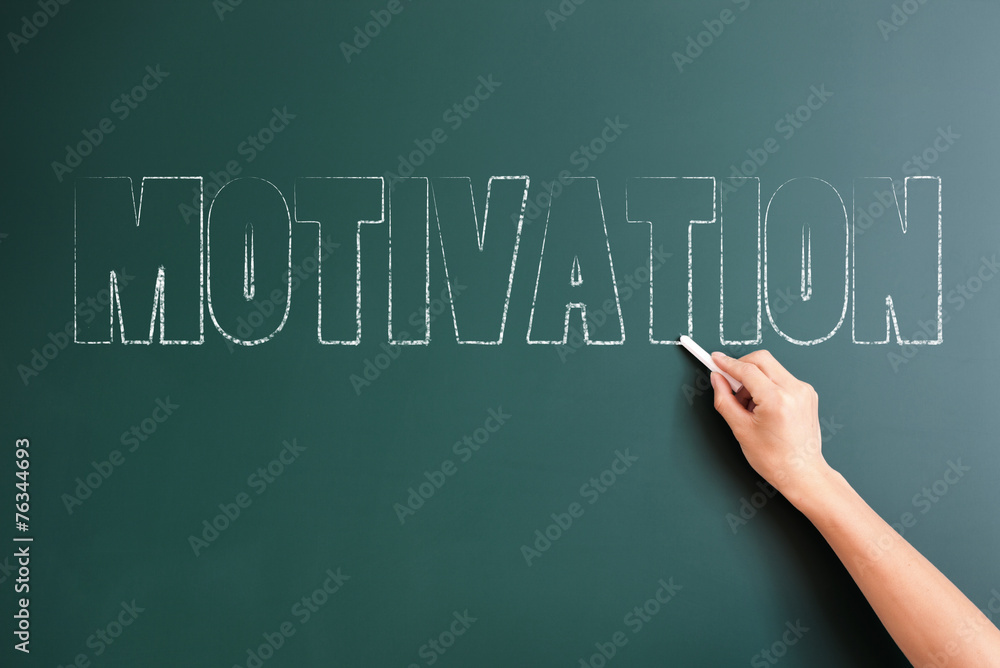 motivation written on blackboard