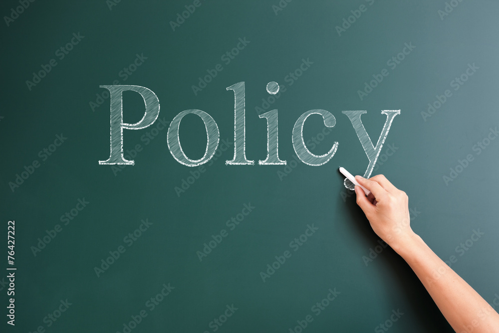 policy written on blackboard