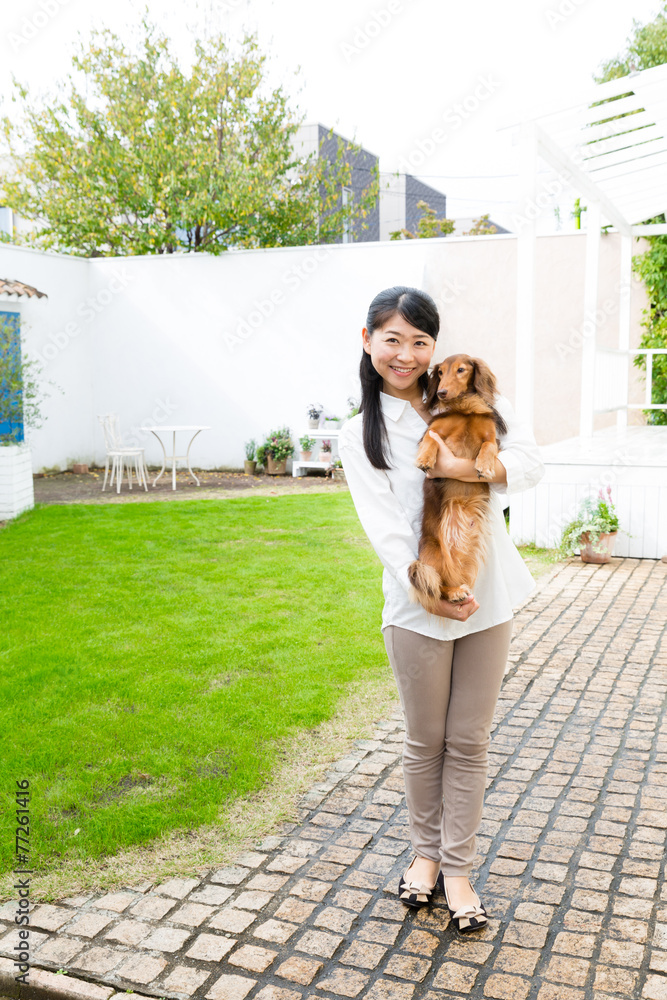 asian woman and dog lifestyle image