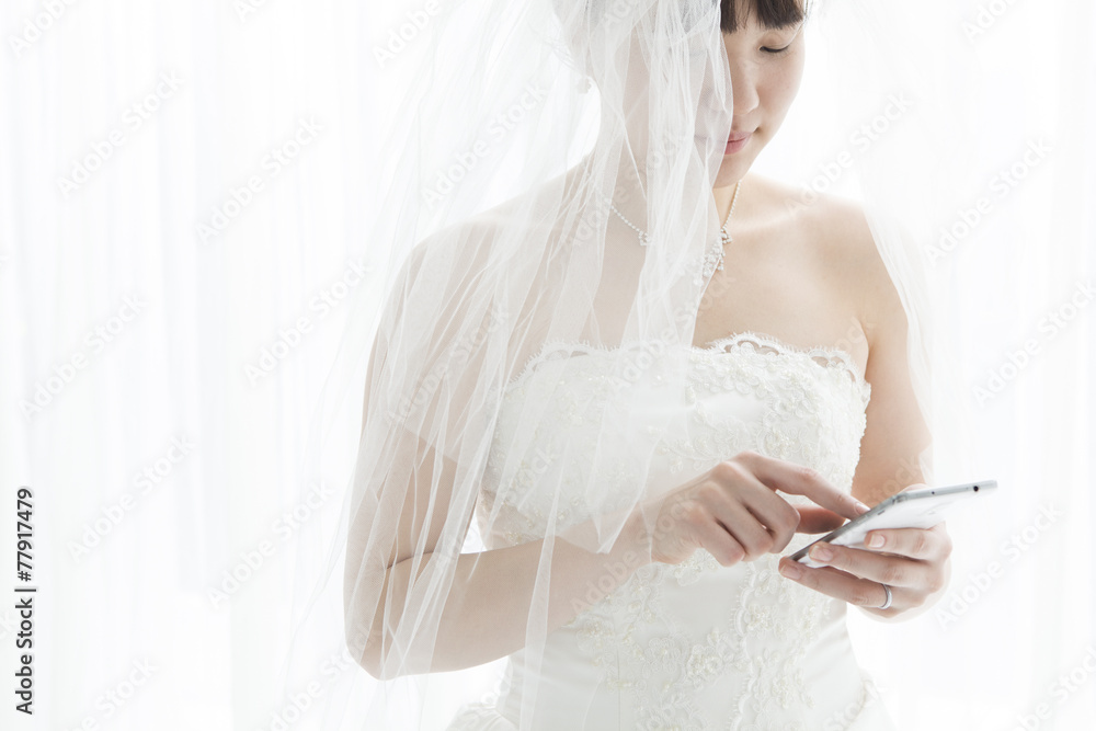 Bride that using a mobile phone