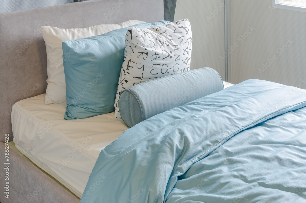 single bed in kids bedroom with blue