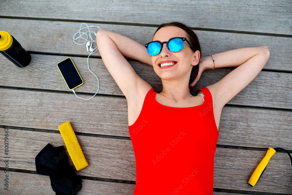 Sport woman on the sunbed