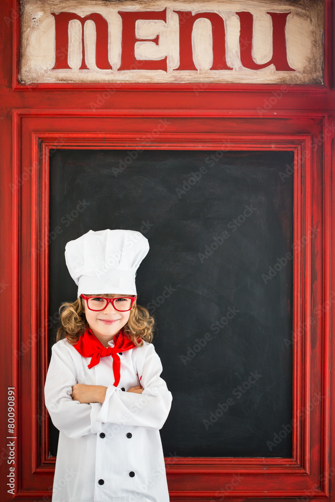 Child chef cook. Restaurant business concept