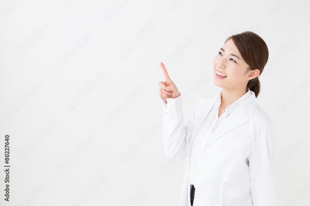 young asian doctor on white background