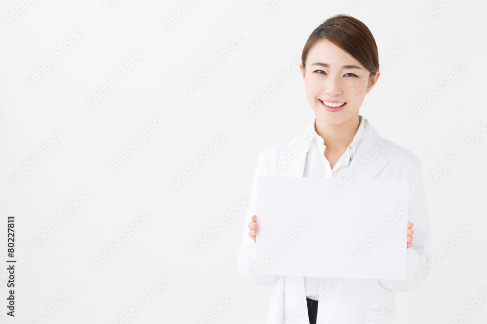 young asian doctor on white background