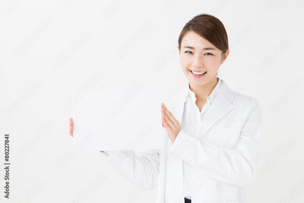 young asian doctor on white background