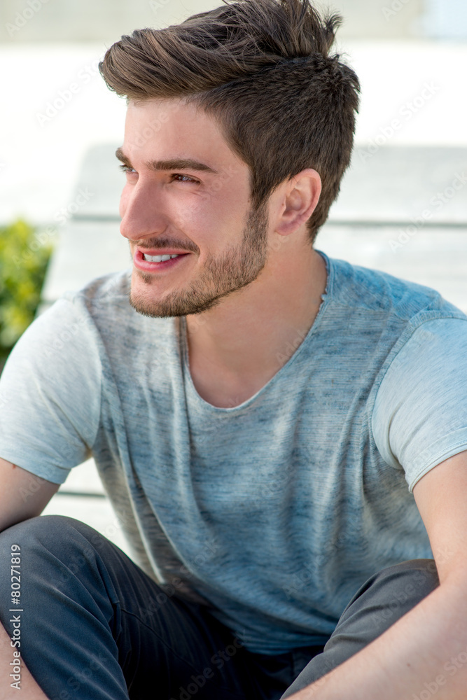 Portrait of a young man laghing