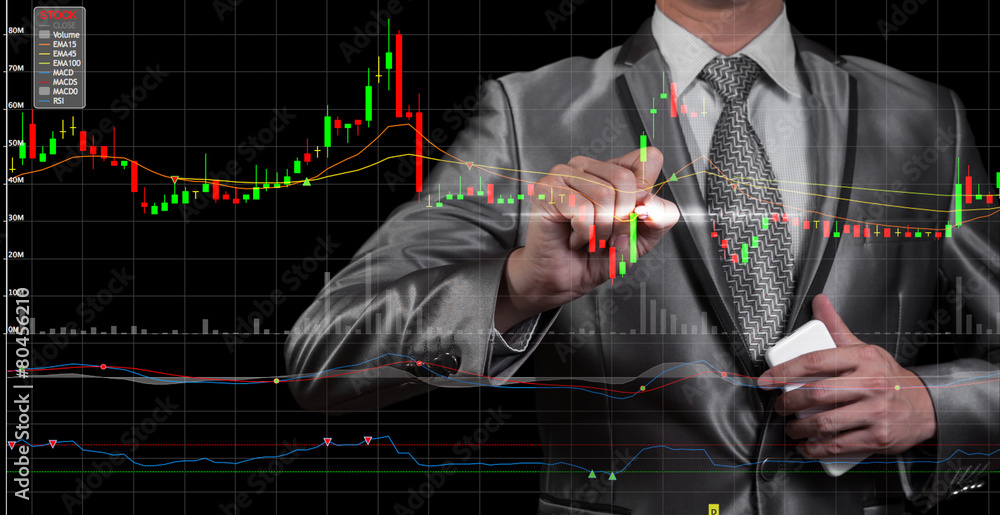 double exposure of businessman with stock market chart