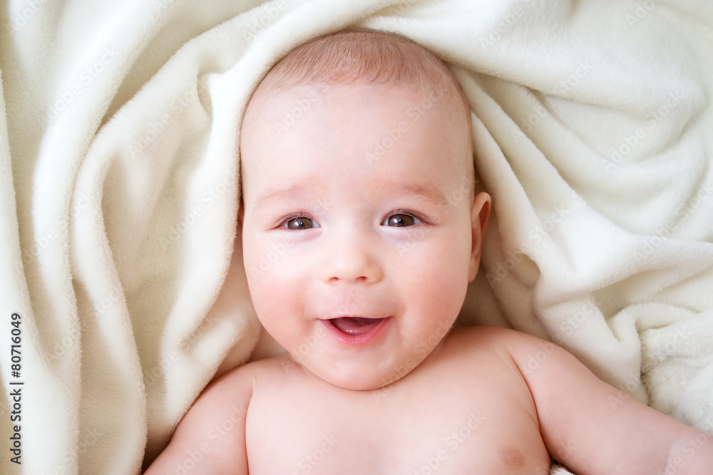 Baby sleeping covered with soft blanket