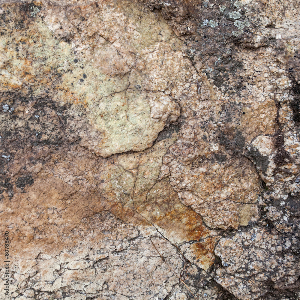 Natural granite stone texture background. Rough and rusty. Close