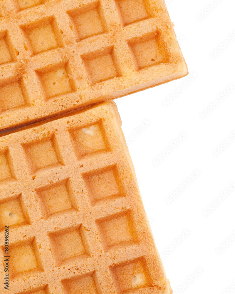 Close - up Delicious sweet waffle on white background .