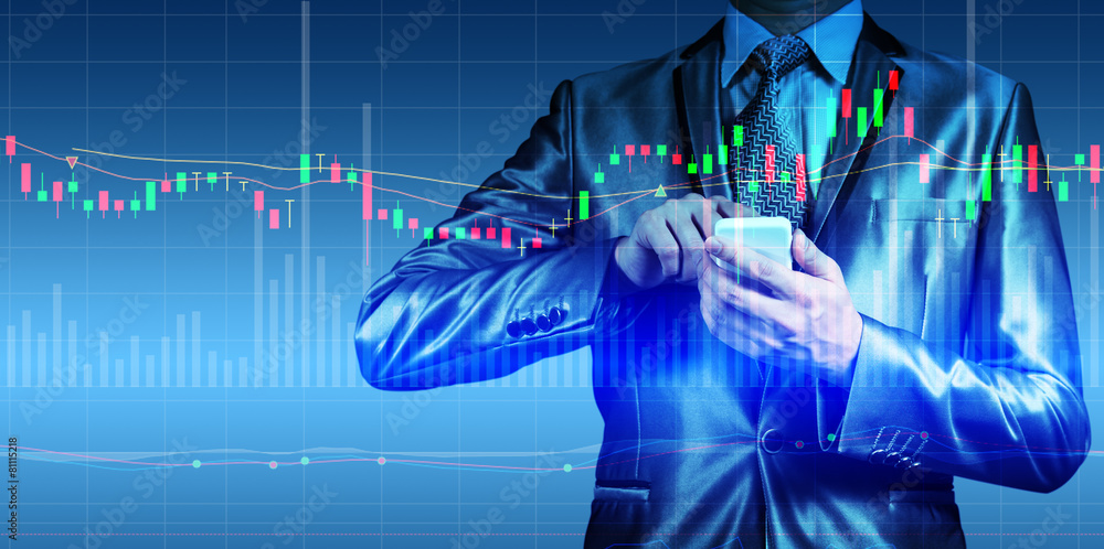 double exposure of businessman with stock market chart