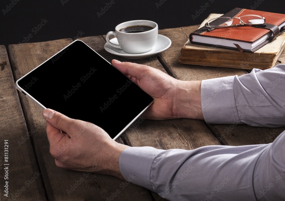 Air. Woman shows screen of digital tablet in her hands