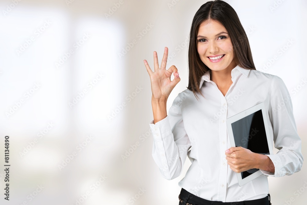 Application. Beautiful young asian woman using tablet computer