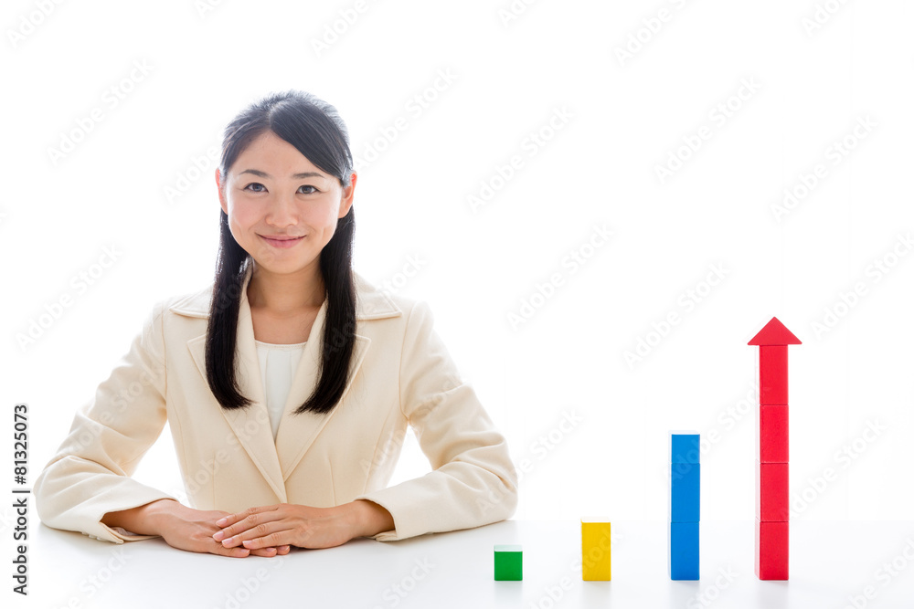 asian businesswoman with building block