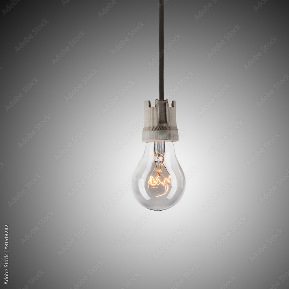 Light bulb hanging on wire