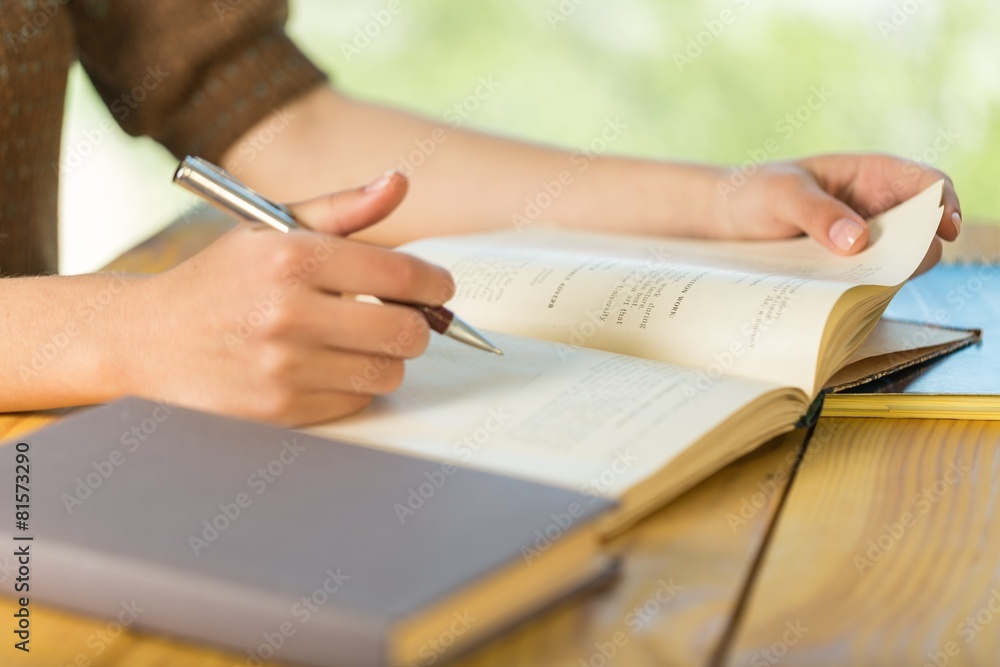 Writing. Young women and education, close up of hands of girl