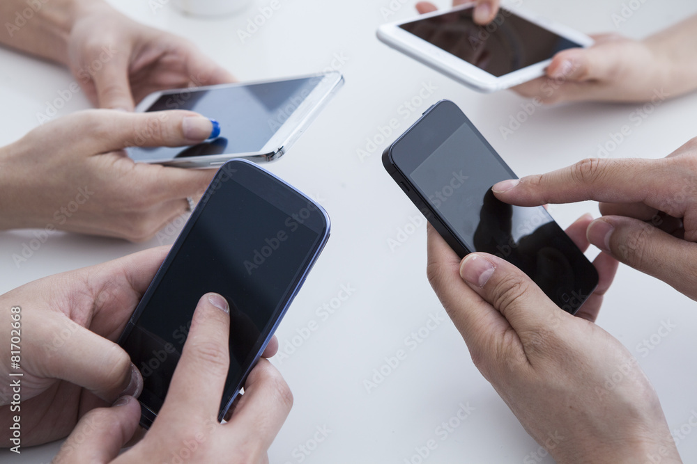 Four people,  mobile phone, information society,