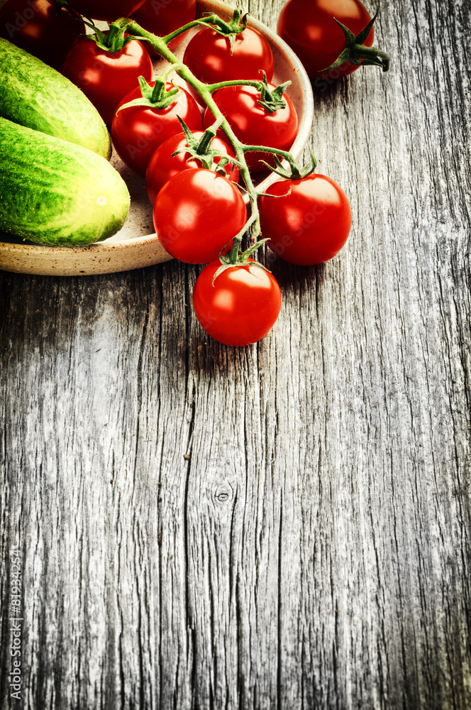 Fresh cherry tomatoes and cucumbers