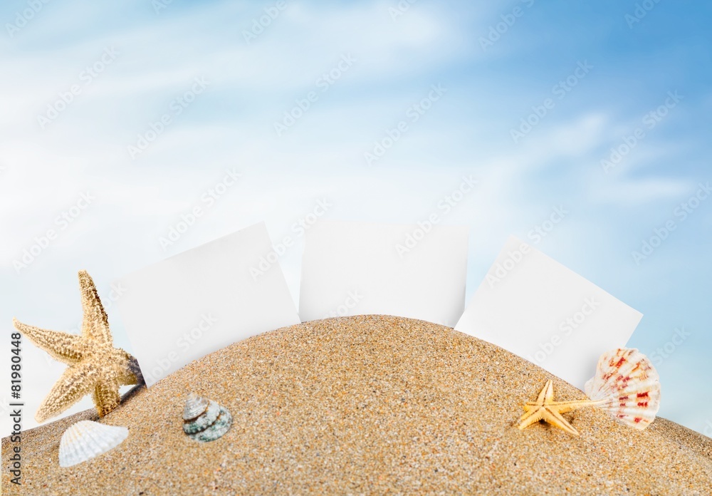 Travel. Photo frames on the sea sand on the beach background