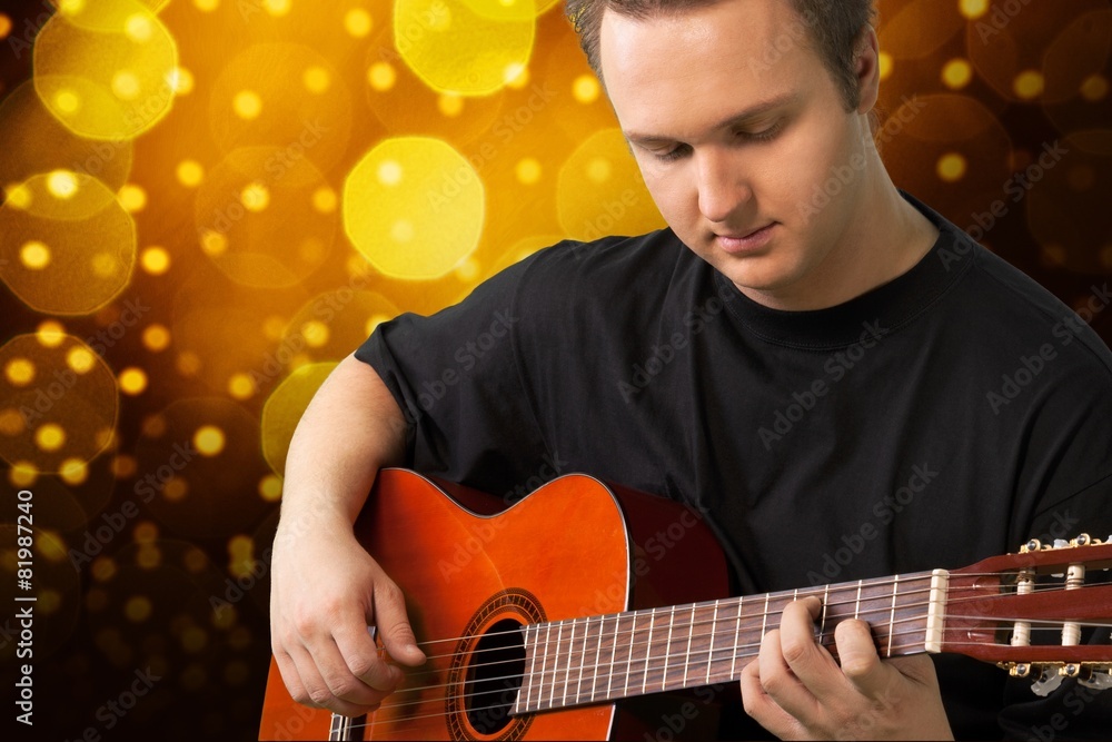 Guitar. Young musician