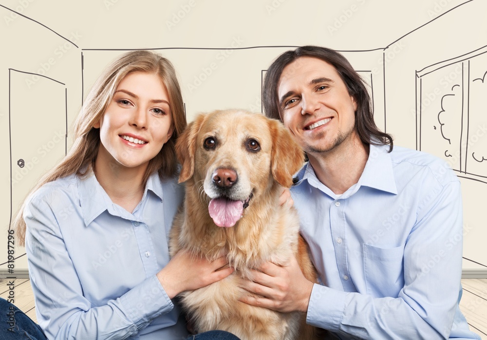 Store. Happy couple taking their beautiful dog to the vet