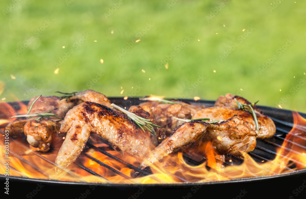 Chicken wings on grill