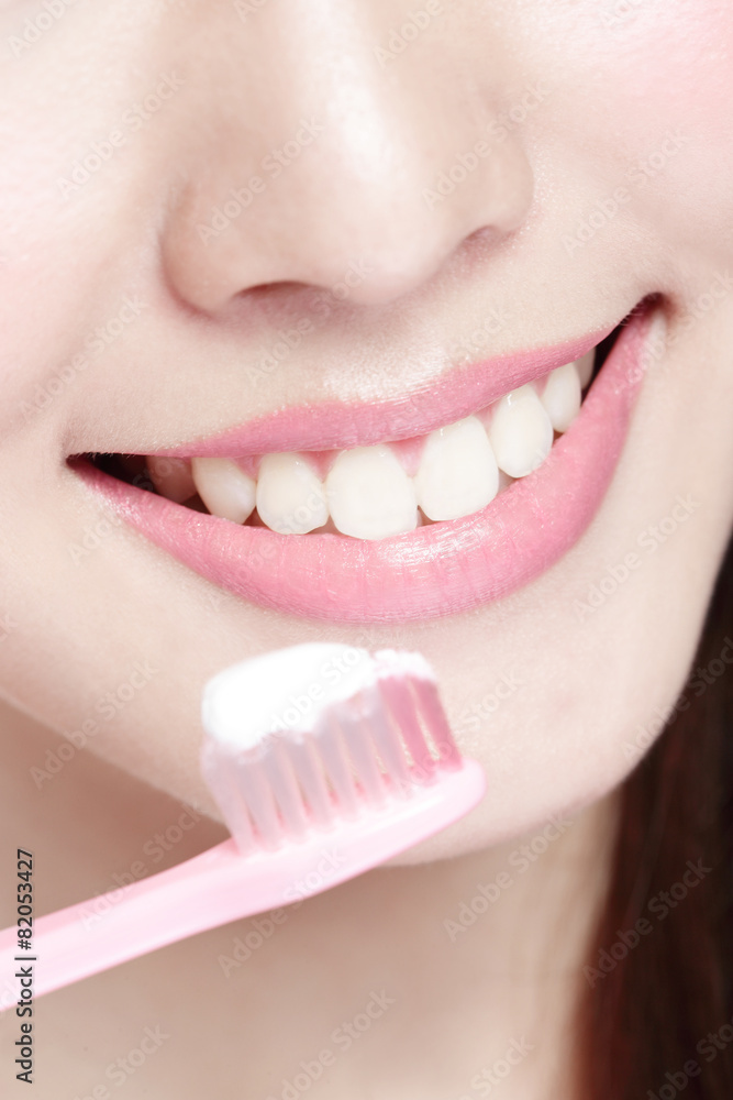 Smile woman brush teeth