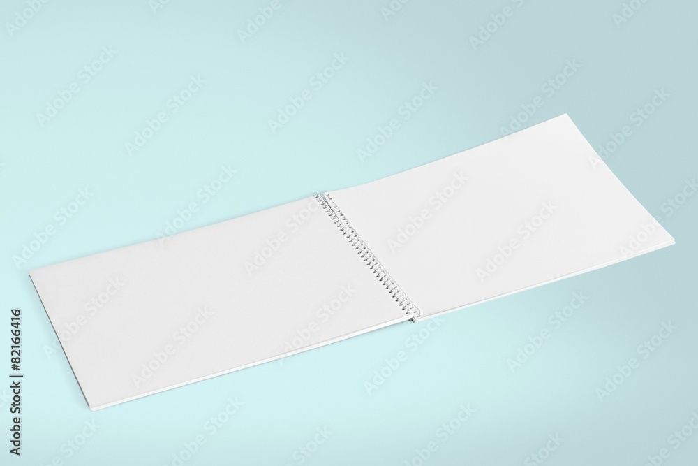 Blank. Blank opened magazine isolated on grey background with