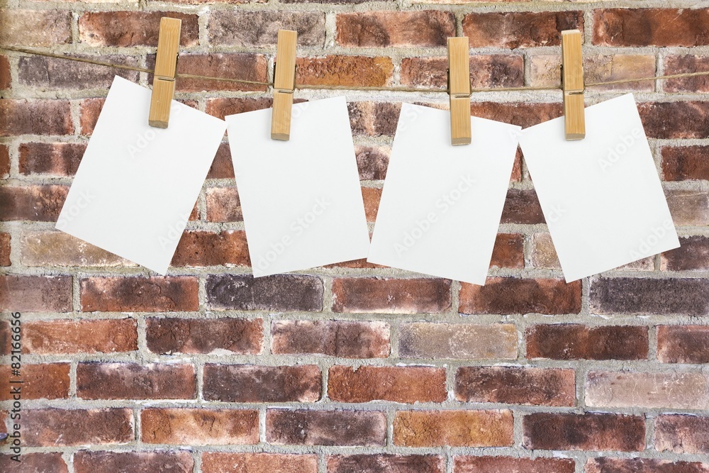 Background. Blank instant photos hanging on the clothesline