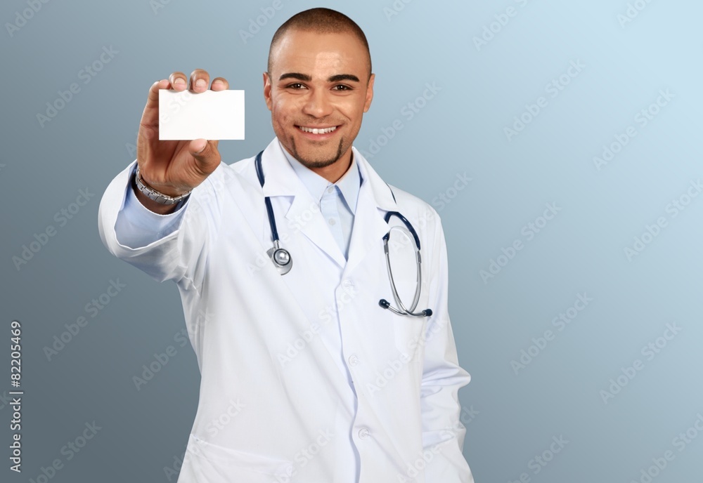 Doctor. Doctor holding blank card