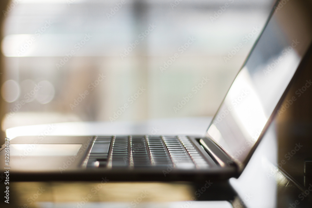 close up of modern laptop at sunrise