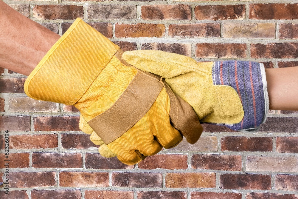 Human Hand. Shaking Hands with Gloves On