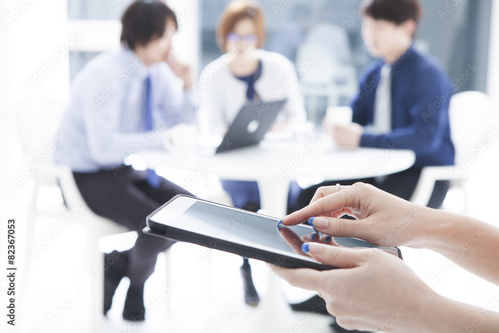 The hands of women who are using electronic tablet