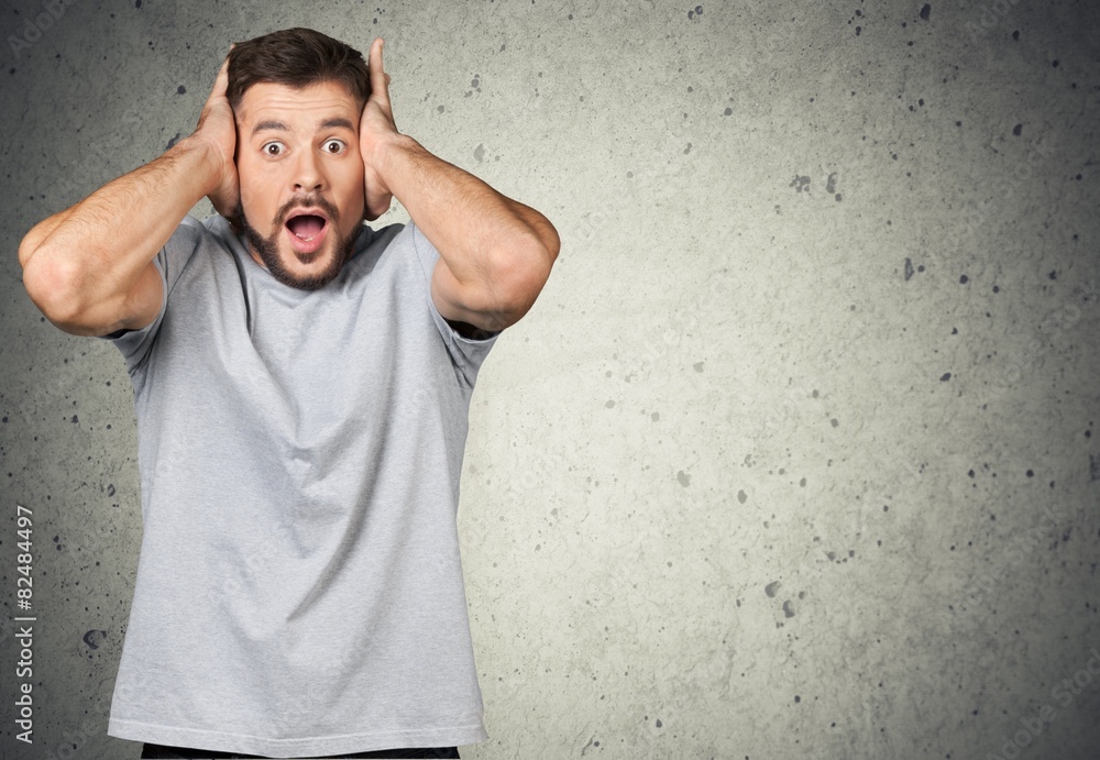 Shock. Portrait of young man with shocked facial expression