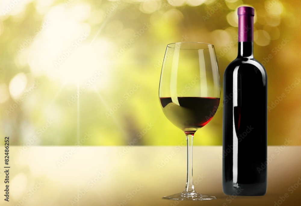 Wine Bottle. Red wine bottle and glass, isolated on white