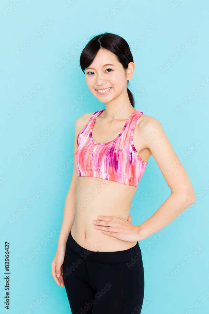 attractive asian woman on blue background