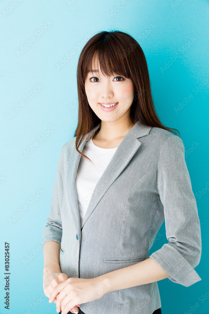 asian businesswoman on blue background