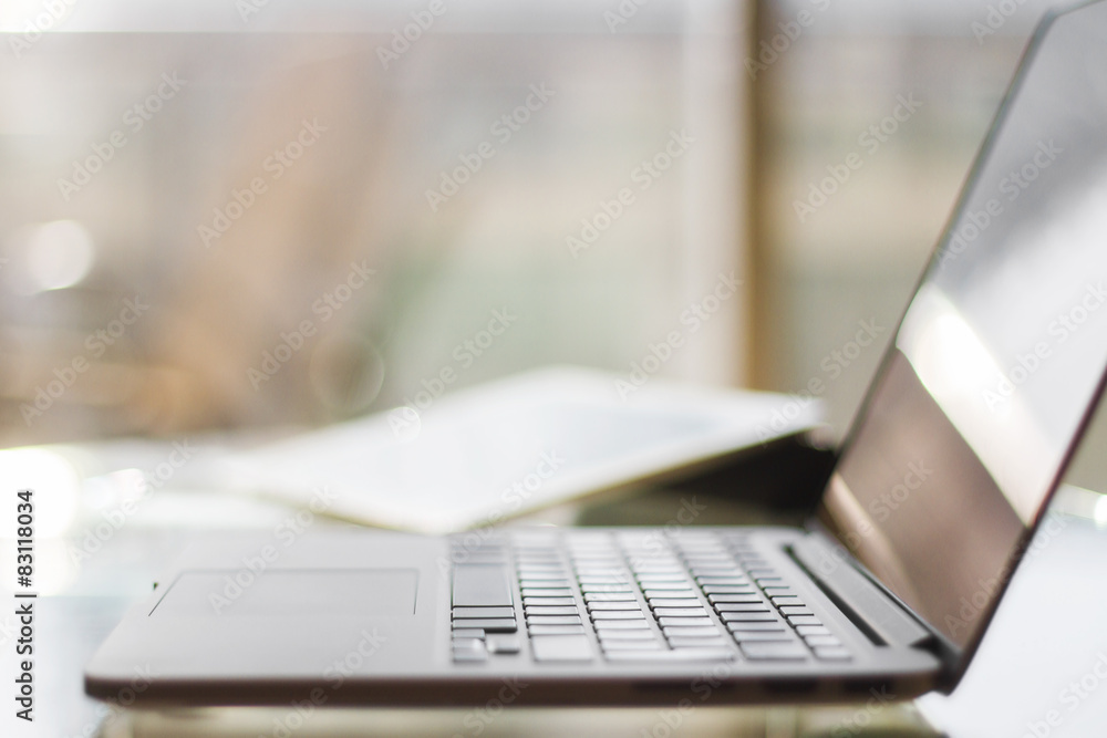 laptop on a table at home, shallow depth of field