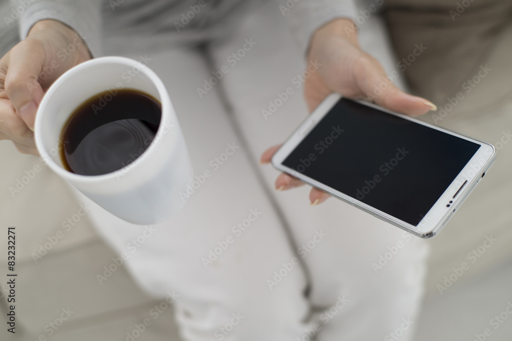 Women have a coffee and smartphone