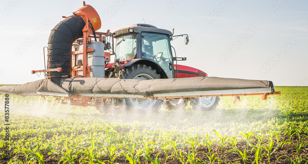 tractor spraying pesticides