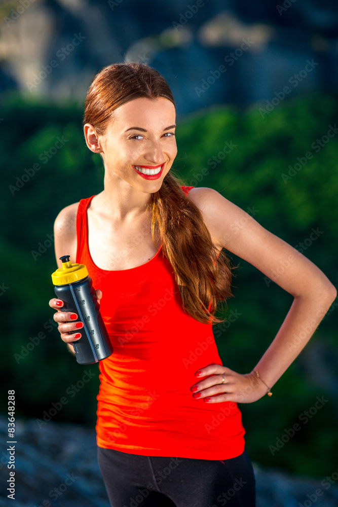 Sport woman in the mountains