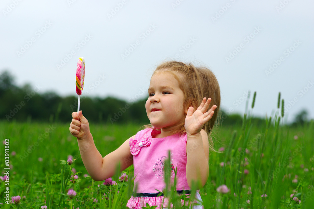  girl eating a lollipop