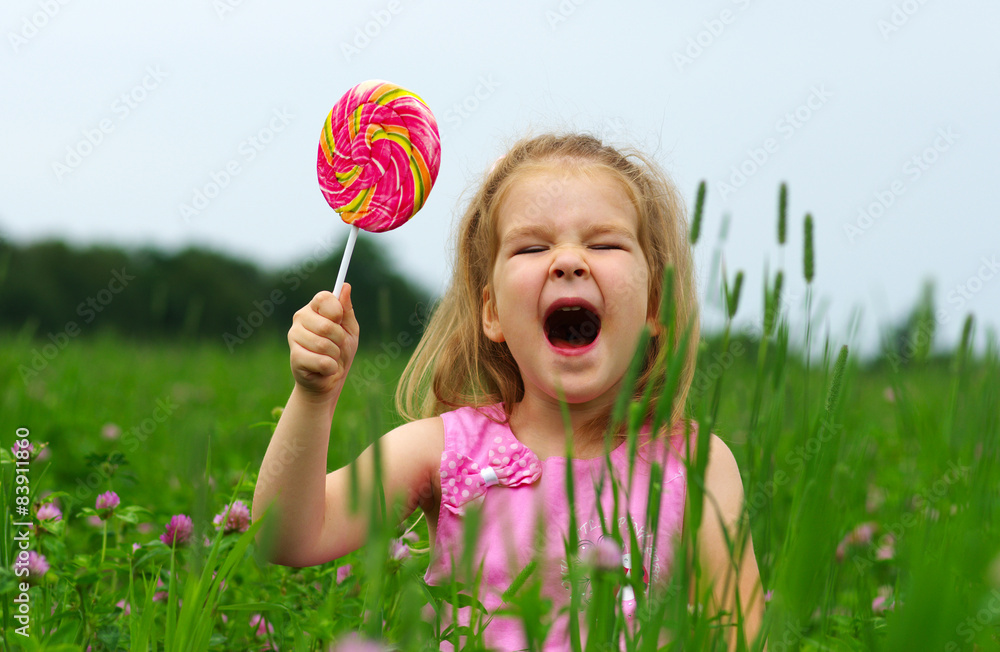  girl eating a lollipop