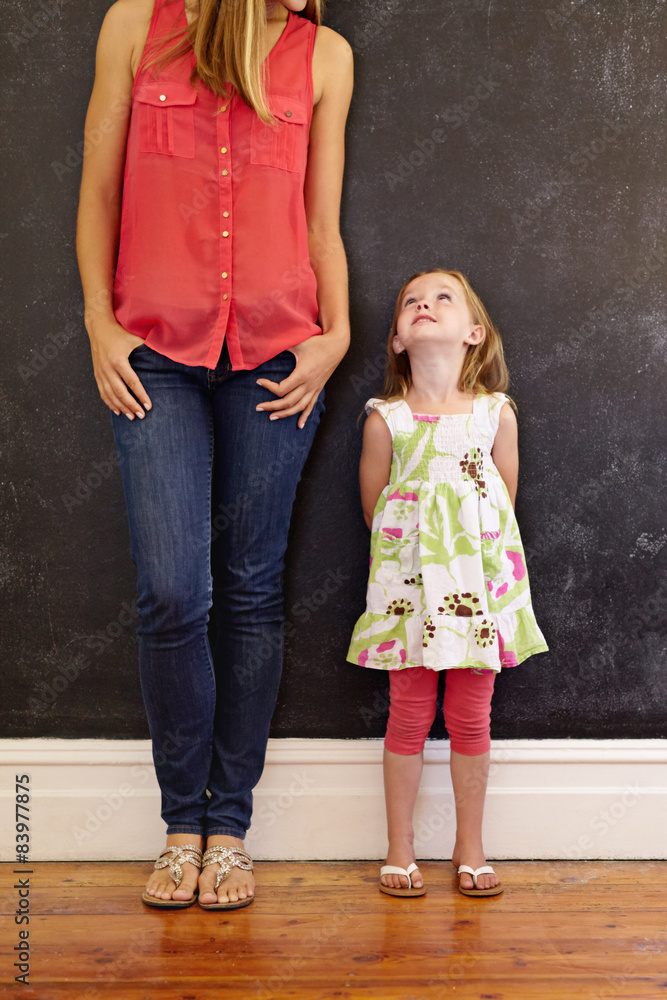 Little girl looking at her mother