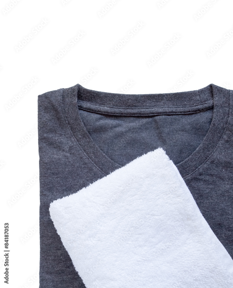 White towel and black t - shirt on white background