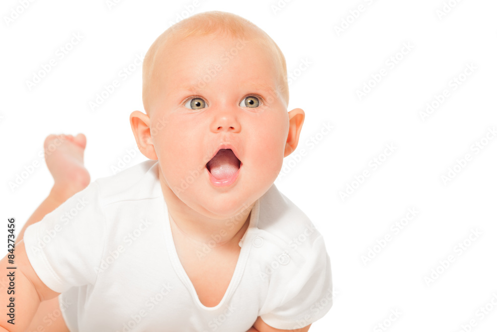 Portrait of baby with open mouth in white bodysuit